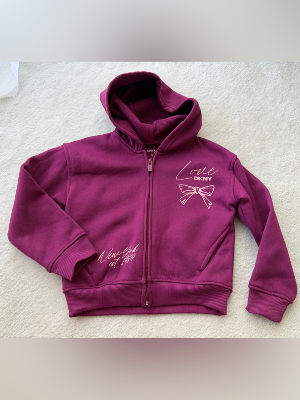 DKNY Kids Zip-Up Fleece Hoodie in Berry Plum with Bow Graphic